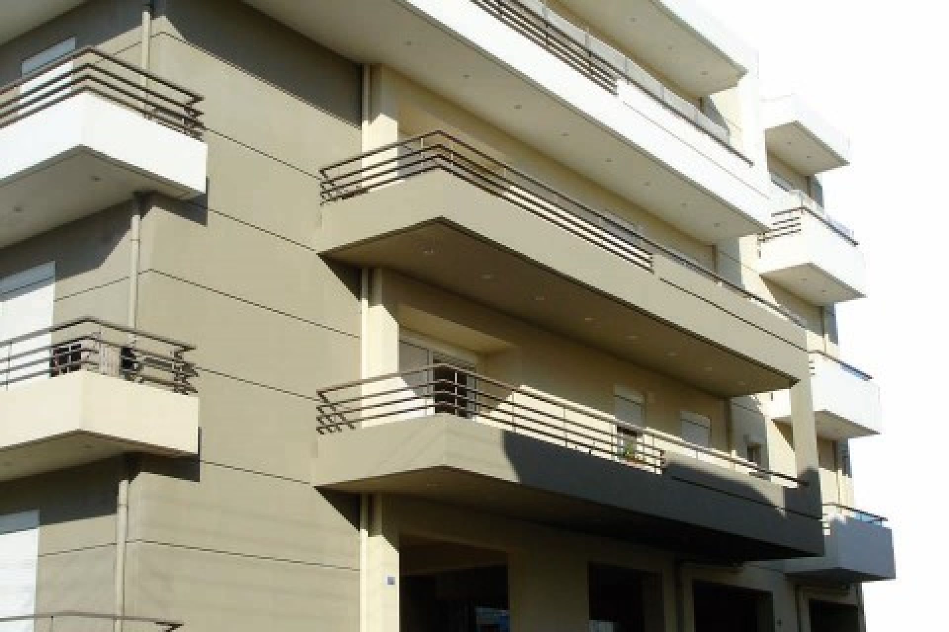 Four-storey residential complex with pilotis section & basement