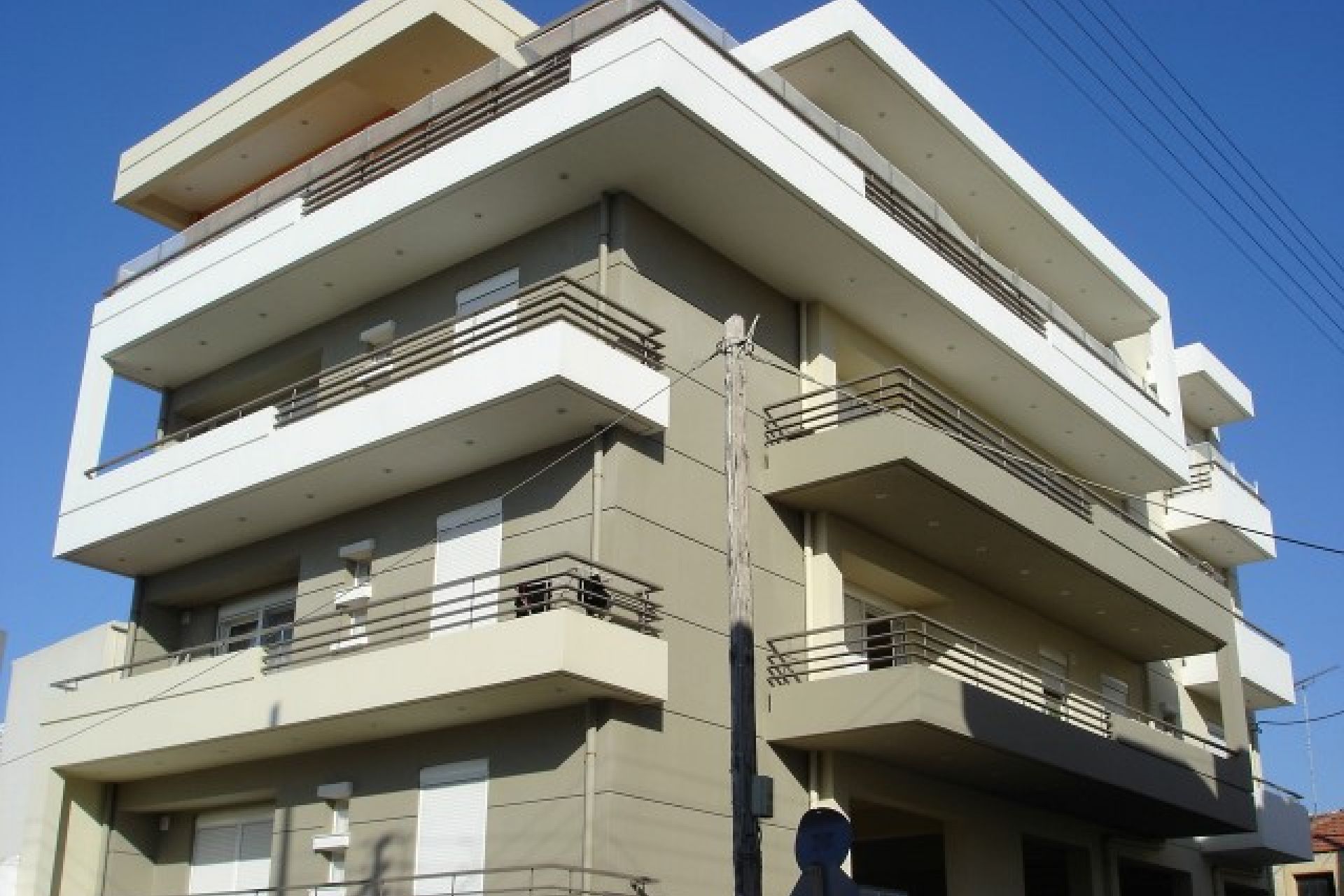 Four-storey residential complex with pilotis section & basement